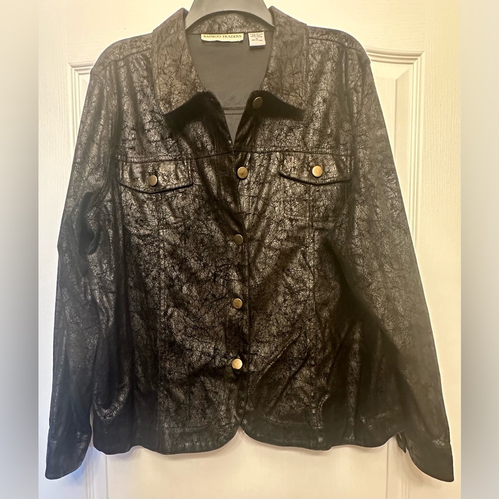 Ladies Light weight button front jacket.